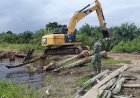 Sasaran Fisik TMMD Ke-129 Kodim 0313/KPR, Di Kebut Gunakan Alat Berat Untuk Peningkatan Badan Jalan 2.5 KM x 5 Meter